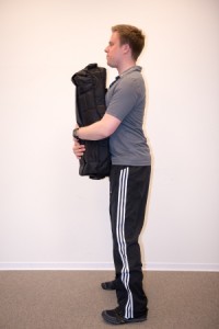 Ausgangsposition der Sandbag Kniebeuge